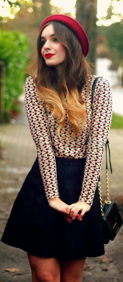 Black skirt, Print shirt. Red Hats are cool.