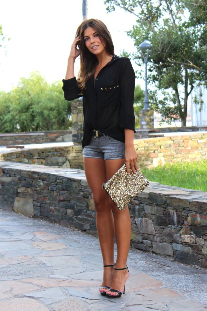 Cute outfit; black top, jean shorts, ankle-strap heels and clutch